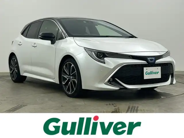 トヨタ カローラ スポーツ ハイブリッドG Z 岡山県 2021(令3)年 1万km アティチュードブラックマイカ/プラチナホワイトパールマイカ 純正ディスプレイオーディオ/(USB/BT/Mira Cast)/バックモニター/ビルトインETC/社外ドライブレコーダー前後/前席シートヒーター/衝突軽減ブレーキ/レーダークルーズコントロール/レーンキープアシスト/オートハイビーム/LEDオートヘッドライト/ヘッドアップディスプレイ/ブラインドスポットモニター/ミラーヒーター/純正フロアマット/純正18インチAAW