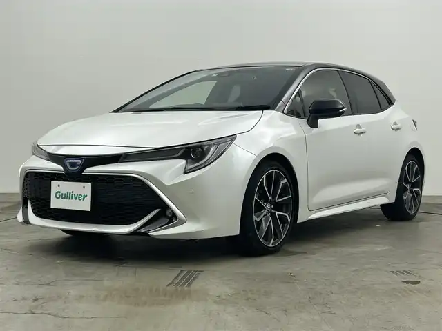 トヨタ カローラ スポーツ ハイブリッドG Z 岡山県 2021(令3)年 1万km アティチュードブラックマイカ/プラチナホワイトパールマイカ 純正ディスプレイオーディオ/(USB/BT/Mira Cast)/バックモニター/ビルトインETC/社外ドライブレコーダー前後/前席シートヒーター/衝突軽減ブレーキ/レーダークルーズコントロール/レーンキープアシスト/オートハイビーム/LEDオートヘッドライト/ヘッドアップディスプレイ/ブラインドスポットモニター/ミラーヒーター/純正フロアマット/純正18インチAAW