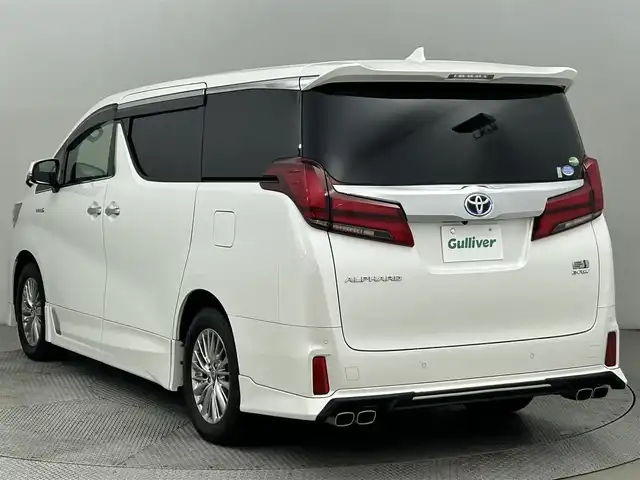 トヨタ アルファードハイブリット SR Cパッケージ 道央・札幌 2019(令1)年 2.4万km ホワイトパールクリスタルシャイン ・DOP１０インチSDナビ（NSZN-Z68T）/　CD/DVD/SD/BT/HDMI/フルセグTV/・純正12.1インチフリップダウンモニター（V12T-R68C）/・ツインムーンルーフ/・デジタルインナーミラー/・ビルトインETC2.0/・TRDエアロ＋マフラー/・積込RAYS/VERUSUS１９インチAW/　（夏245/45R19　残８ｍｍ）/・レーダークルーズコントロール（全車速追従機能付）/・トヨタセーフティセンス/　PCS/　LTA(センタートレース、操舵支援、ふらつき検知)/　PKSB/　BSM/　RSA/　先行車発進告知/・クリアランスソナー前後/・EV＆ECO MODE/・ブレーキホールド/・電子パーキングブレーキ/・ステアリングヒーター/・レザーシート/・D席メモリーシート/・D+N席シートベンチレーション/・D+N+２列目シートヒーター/・nanoe付デュアルAAC（WAC）/・三眼LEDヘッドライト/・LEDフォグランプ/・LEDフットイルミネーション/・オートマチックハイビーム/・オートライト/・オートワイパー/・ステアリングスイッチ/・格納式リヤサンシェード/・純正フロアマット/・ドアバイザー/・ドアミラーウィンカー/・プッシュスタート/・スマートキー