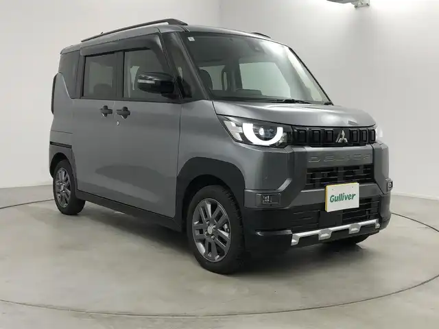三菱 デリカミニ T プレミアム 愛知県 2024(令6)年 2万km グレー 4WD/寒冷地仕様/e-Assist/  　・衝突被害軽減ブレーキシステム/　　・車線逸脱警報システム/　　・ふらつき警報/　　・オートマチックハイビーム/　　・標識認識システム/マイパイロット/　　・レーダークルーズコントロール/　　・車線維持支援機能/デジタルインナーミラー/純正9インチディスプレイオーディオ/Bluetooth対応/マルチアラウンドモニター/ETC/革巻きステアリング/ステアリングヒーター/ハーフレザーシート/シートヒーター（前席）/両側パワースライドドア/純正LEDヘッドライト/フォグランプ/純正15インチアルミホイール