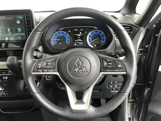 三菱 デリカミニ T プレミアム 愛知県 2024(令6)年 2万km グレー 4WD/寒冷地仕様/e-Assist/  　・衝突被害軽減ブレーキシステム/　　・車線逸脱警報システム/　　・ふらつき警報/　　・オートマチックハイビーム/　　・標識認識システム/マイパイロット/　　・レーダークルーズコントロール/　　・車線維持支援機能/デジタルインナーミラー/純正9インチディスプレイオーディオ/Bluetooth対応/マルチアラウンドモニター/ETC/革巻きステアリング/ステアリングヒーター/ハーフレザーシート/シートヒーター（前席）/両側パワースライドドア/純正LEDヘッドライト/フォグランプ/純正15インチアルミホイール