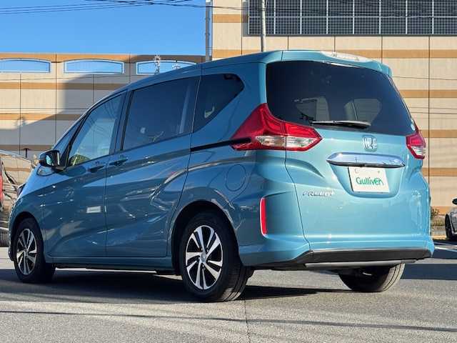 ホンダ フリード＋ G ホンダセンシング 宮城県 2017(平29)年 4.5万km ブルーホライゾンM 登録時走行距離44489ｋｍ/両側パワースライドドア/レーダークルーズコントロール/純正ナビ/・フルセグテレビ/・Bluetooth/純正ドライブレコーダー/バックカメラ/ビルトインＥＴＣ/衝突被害軽減ブレーキ/レーンキープアシスト/ＬＥＤヘッドライト/オートライト/横滑り防止機能/純正アルミホイール/プッシュスタート/スマートキー/ウインカーミラー/電格ミラー/純正フロアマット/後席サンシェード