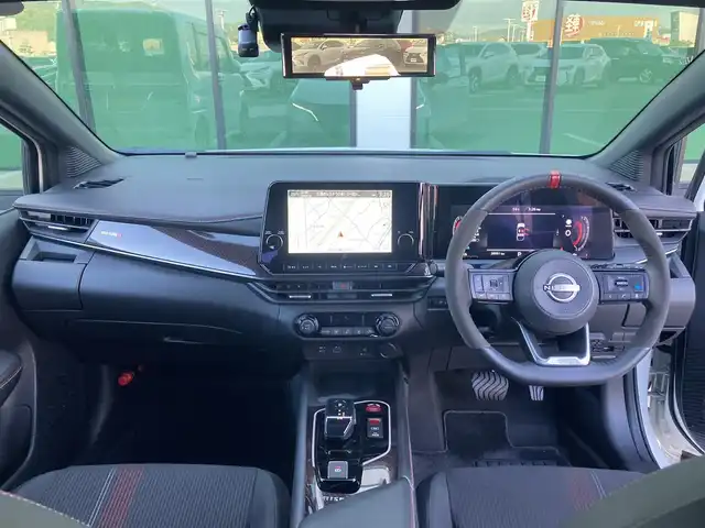 日産 オーラ ニスモ 香川県 2021(令3)年 2.9万km ピュアホワイトパール / スーパーブラック 2トーン 登録時走行距離：28951km/純正9型ナビ/　BT　フルセグTV/全方位カメラ/エマージェンシーブレーキ/レーダークルーズコントロール/レーンキープアシスト/クリアランスソナー/ブラインドスポットモニター/オートハイビーム/LEDヘッドライト/フォグランプ/リアフォグ/電子パーキングブレーキ/置くだけ充電/デジタルインナーミラー/ドライブレコーダー/ビルトインETC2.0/ハーフレザーシート/プッシュスタート/スマートキー