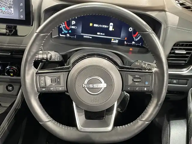 日産 エクストレイル G e－4ORCE 愛知県 2023(令5)年 3.4万km ブリリアントホワイトパール 純正１２．３インチナビ　/（AM/FM/フルセグTV/Bluetooth/USB/CarPlay)/アラウンドビューモニター　/プロパイロット　/自動駐車システム（プロパイロットパーキング）　/ＡＣ１００Ｖ　/ビルトインＥＴＣ２．０　/全席シートヒーター　/電動バックドア　/デジタルインナーミラー　/ワイヤレス充電　/ブラインドスポットモニター（ＢＳＭ）/ヘッドアップディスプレイ（HUD）/メモリ機能付パワーシート/クリアランスソナー/車線逸脱警報/LEDヘッドライト/LEDフォグランプ/黒レザーシート