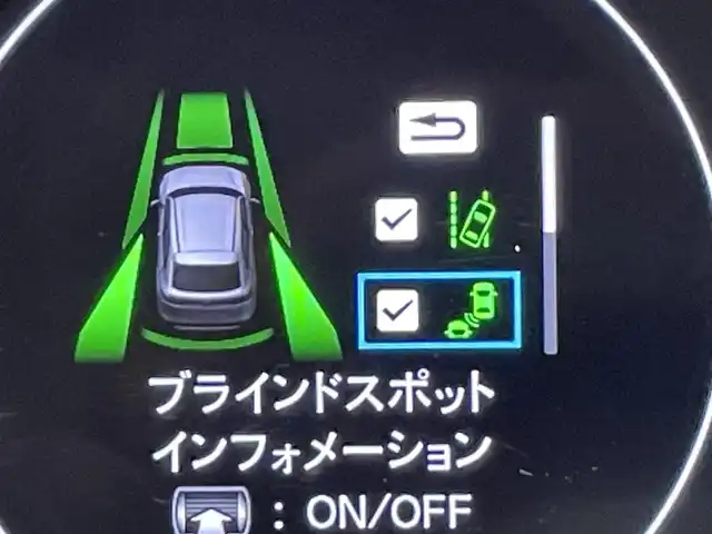 ホンダ ヴェゼル ハイブリッド e:HEV Z 愛知県 2024(令6)年 1.3万km クリスタルブラックパール 純正９インチホンダコネクトディスプレーナビ　/（AM/FM/フルセグTV/Bluetooth/CarPlay/USB)/ワイヤレス充電　/ホンダセンシング　/　　-衝突軽減ブレーキ（CMBS）/　　-レーダークルーズコントロール　/　　-誤発進抑制機能/　　-路外逸脱抑制機能　/　　-車線維持支援システム/　　-先行車発進お知らせ機能/　　-標識認識機能/　　-オートハイビーム/ブラインドスポットインフォメーション/後退出庫サポート/シートヒーター　/ステアリングヒーター/ビルトインＥＴＣ２．０　/純正前後ドライブレコーダー　/バックカメラ　/電動バックドア　/パドルシフト/ハーフレザーシート/純正フロアマット
