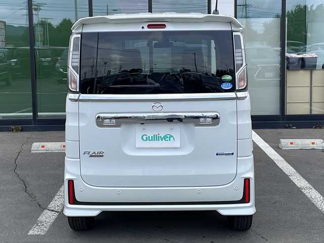 マツダ フレアワゴン カスタムスタイル ハイブリッド XS 道東・釧路十勝 2020(令2)年 4.8万km ピュアホワイトP ・４WD/・社外SDメモリナビ/（CD・DVD・AM・FM・BT・フルセグ）/・バックカメラ/・両側パワースライドドア/・ETC/・前後ドライブレコーダー/・アイドリングストップ/・スマートキー/・プッシュスタート/・衝突被害軽減ブレーキ/・横滑り防止装置/・車線逸脱防止機能/・革巻きステアリング/・ハーフレザーシート/・前席シートヒーター/・オートライト/・ヒーテッドドアミラー/・LEDヘッドライト/・フォグライト/・純正フロアマット/・ドアバイザー