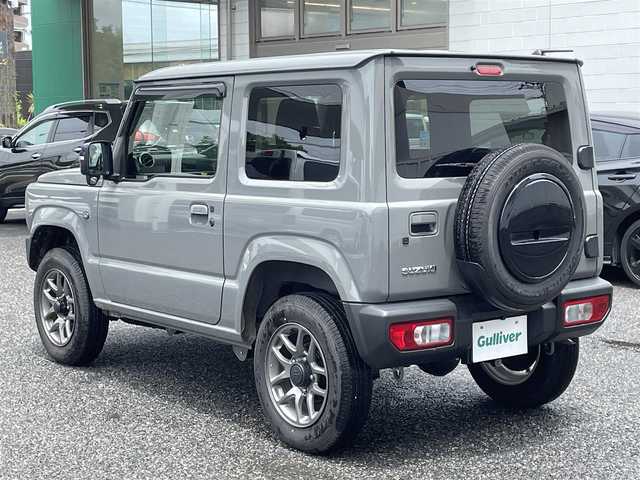 スズキ ジムニー XC 愛知県 2024(令6)年 0.5万km ミディアムグレー 4WD/ワンオーナー/アルパインナビ（9インチ）/AM/FM/SD/DVD/フルセグ/BT/HDMI/バックカメラ/衝突軽減/クルーズコントロール/オートハイビーム/レーンキープ/ダウンヒルアシストコントロール/ヒートシーター/スマートキー２/LED/フォグランプ/取説/保証書