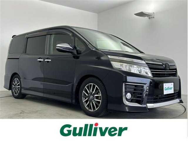 トヨタ ヴォクシー ZS 煌 大分県 2015(平27)年 6万km ブラック トヨタセーフティセンス/　　・プリクラッシュセーフティ/　　・レーンディバーチャーアラート/　　・オートマチックハイビーム/純正9インチナビ/　　CD/DVD/BT/フルセグ/バックカメラ/ビルトインETC/後席フリップダウンモニター/キャプテンシート/両側パワースライドドア/ローダウン/純正LEDヘッドライト/フォグランプ/純正16インチアルミホイール