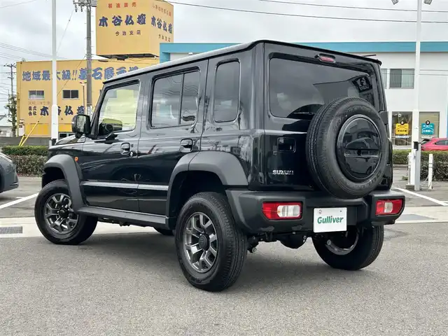 スズキ ジムニー ノマド FC 愛媛県 2025(令7)年 0.3万km 黒 登録時走行距離:2251km/社外オーディオ/AM/FM/Bluetooth/Apple car play/4WD/Bカメラ/追従クルコン/レーンキープアシスト/衝突軽減システム/横滑り防止装置/LEDヘッドライト/オートライト/エンジンスタートボタン/スマートキー/シートヒーター/純正アルミホイール/純正フロアマット