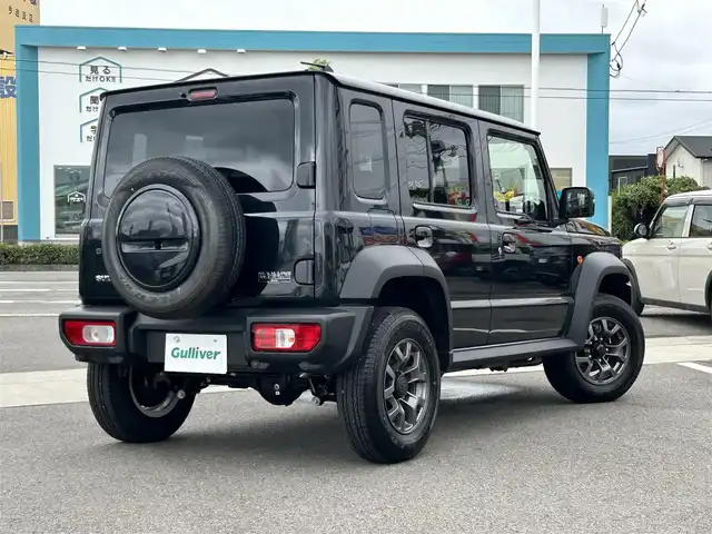 スズキ ジムニー ノマド FC 愛媛県 2025(令7)年 0.3万km 黒 登録時走行距離:2251km/社外オーディオ/AM/FM/Bluetooth/Apple car play/4WD/Bカメラ/追従クルコン/レーンキープアシスト/衝突軽減システム/横滑り防止装置/LEDヘッドライト/オートライト/エンジンスタートボタン/スマートキー/シートヒーター/純正アルミホイール/純正フロアマット