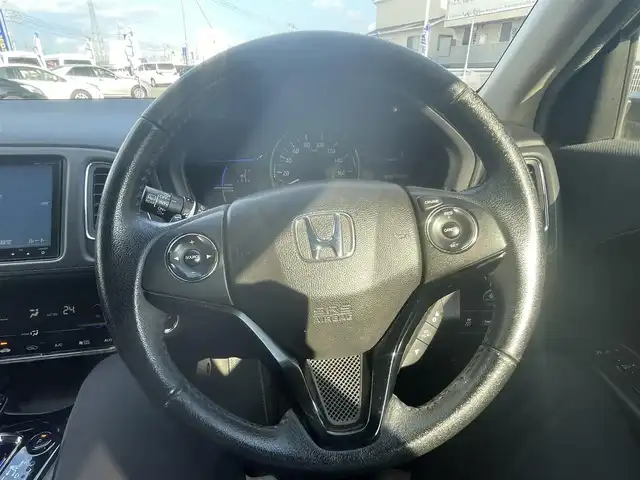 ホンダ ヴェゼル ハイブリッド X Lパッケージ 岡山県 2014(平26)年 11.3万km ホワイトオーキッドパール (株)IDOMが運営する【じしゃロン岡山店】の自社ローン専用車両になります。こちらは現金またはオートローンご利用時の価格です。自社ローンご希望の方は別途その旨お申付け下さい/純正8インチナビ/Bluetooth/バックカメラ/LEDヘッドライト/ハーフレザーシート/純正17インチAW/クルコン