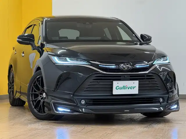 トヨタ ハリアー Z レザーパッケージ 群馬県 2021(令3)年 7.6万km プレシャスブラックパール モデリスタフルエアロ/JBLサウンド/トヨタセーフティセンス/・レーダークルーズコントロール/・プリクラッシュセーフティ/・レーンディパーチャーアラート/・ブラインドスポットモニター/・パーキングセンサー/・ヘッドアップディスプレイ/・ロードサインアシスト/・オートハイビーム/純正12.3インチナビ/　　フルセグ/BT/USB/AUX/    AM/FM/Miracast/パノラミックビューモニター/BLITZ車高調/RAYS20インチAW/社外シーケンシャルテールランプ/純正19AW、純正ショック、純正テール車載/パワーバックドア/デジタルインナーミラー/黒革シート/前席パワーシート/前席シートヒーター/前席エアーシート/ステアリングヒーター/オートLEDヘッドライト/フォグランプ/ビルドインETC2.0