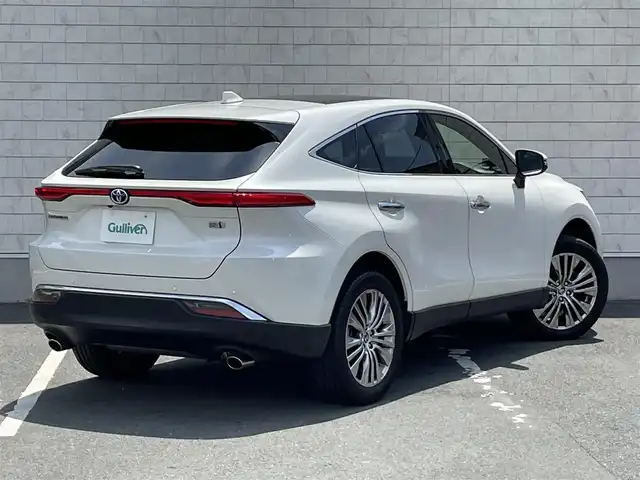 トヨタ ハリアー ハイブリッド Z レザーパッケージ 愛知県 2021(令3)年 3.1万km ホワイトパールクリスタルシャイン ・ワンオーナー/・純正JBLサウンドディスプレイオーディオ（ナビ有り）/・フルセグTV/・調光式パノラマルーフ/・Bluetooth/USB/AUX接続/・全方位カメラ/・コーナーセンサー/・純正デジタルインナーミラー（後方撮影内蔵）/・本革シート/・パワーシート（D/N）/・シートヒーター（D/N）/・シートベンチレーション（D/N）/・電動チルト&テレスコピック/・純正19インチアルミホイール/・パワーバックドア/・ステアリングヒーター/・充電用USBポート/・アダプティブクルーズコントロール/・純正LEDヘッドライト/・オートマチックハイビーム/・ヘッドアップディスプレイ/・衝突軽減ブレーキ/・レーンキープアシスト/・ブラインドスポットモニター/・セルスターレーダー探知機/・純正ラゲッジマット