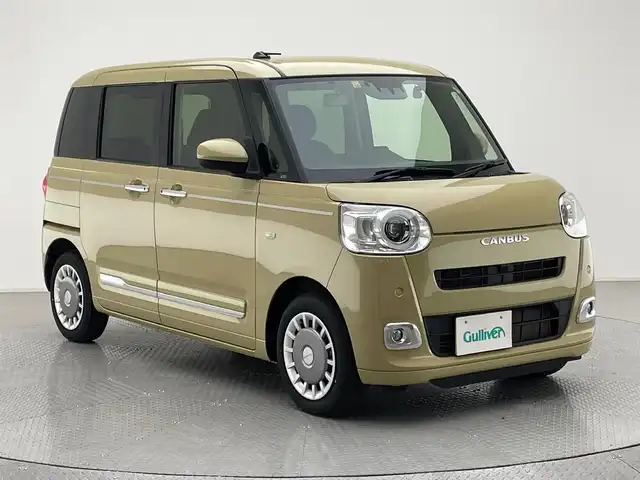 ダイハツ ムーヴ キャンバス セオリー G 兵庫県 2022(令4)年 2.9万km サンドベージュメタリック 純正メモリナビ/（CD/DVD/Bluetooth/フルセグTV/HDMI）/・NMZN-W73D/バックカメラ/横滑り防止装置/盗難防止装置/カーテンエアバッグ/コーナーセンサー（前後）/LKA/プリクラッシュセーフティー/両側パワースライドドア/シートヒーター（D/N席）/LEDヘッドライト/LEDフォグランプ/オートライト/オートマチックハイビーム/前方ドライブレコーダー/ETC/純正フロアマット/スマートキー/スペアキー1本/アイドリングストップ/ベンチシート