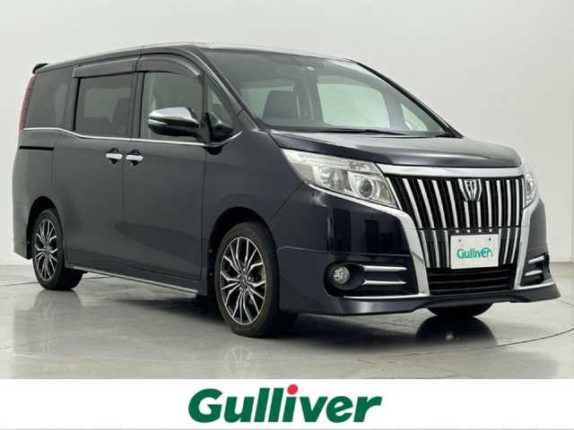 トヨタ エスクァイア Gi 熊本県 2015(平27)年 5.8万km スパークリングブラックパールクリスタルシャイン 純正ナビ（ＣＤ・ＤＶＤ・フルセグ・ＢＴ・ＳＤ）/バックカメラ　/両側パワースライドドア　/前席シートヒーター　/クルーズコントロール　/衝突軽減ブレーキ/横滑り防止/アイドリングストップ　/純正フロアマット/社外１７インチAW/オートライト　/ＬＥＤヘッドライト/オートマチックハイビーム/フォグライト/スマートキー/プッシュスタート