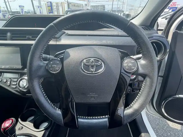 トヨタ アクア G G’s 熊本県 2015(平27)年 10.2万km ライムホワイトパールクリスタルシャイン (株)IDOMが運営する【じしゃロン熊本店】の自社ローン専用車両になります。こちらは現金またはオートローンご利用時の価格です。自社ローンご希望の方は別途その旨お申付け下さい　/社外ナビ（AVIC-ZH007）/バックカメラ/フルセグテレビ/DVD/CD/Bluetooth接続/ETC/ハーフレザーシート/シートヒーター/クルーズコントロール/LEDヘッドライト/オートライト/スマートキー/純正アルミホイール