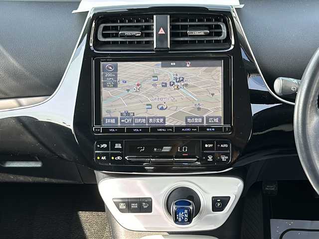 トヨタ プリウス A 愛知県 2016(平28)年 9.4万km スティールブロンドM 登録時93792km/ＬＥＤヘッドライト/純正ナビＴＶ/ＣＤ／ＤＶＤ／ＢＴ　フルセグ/バックカメラ/ＨＵＤ/レーンキープアシスト/プリクラッシュセーフティ/ブラインドスポットモニター/アダプティブクルーズコントロール/純正フロアマット/革巻ステアリング/置くだけ充電/ＥＴＣ