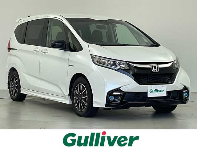 ホンダ フリード ハイブリット モデューロX ホンダセンシング 岐阜県 2018(平30)年 3万km ホワイトオーキッドパール 純正9インチナビ/CD/DVD/Bluetooth/SD/USB/フルセグTV/バックモニター/アダプティブクルーズコントロール/レーンキープアシスト/衝突軽減ブレーキ/両側パワースライドドア/ドライブレコーダー/ステアリングスイッチ/電動格納ミラー/パワーウィンドウ/ETC/スマートキー/プッシュスタート