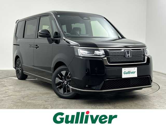 ホンダ ステップワゴン スパーダ eHEV 三重県 2025(令7)年 0.1千km クリスタルブラックパール 登録済未使用車/純正11.4インチナビ/バックカメラ/両側パワースライドドア/前席シートヒーター/パワーバックドア/ブラインドスポットモニター/パドルシフト/クリアランスソナー/LEDヘッドライト