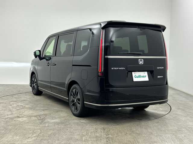 ホンダ ステップワゴン スパーダ eHEV 三重県 2025(令7)年 0.1千km クリスタルブラックパール 登録済未使用車/純正11.4インチナビ/バックカメラ/両側パワースライドドア/前席シートヒーター/パワーバックドア/ブラインドスポットモニター/パドルシフト/クリアランスソナー/LEDヘッドライト
