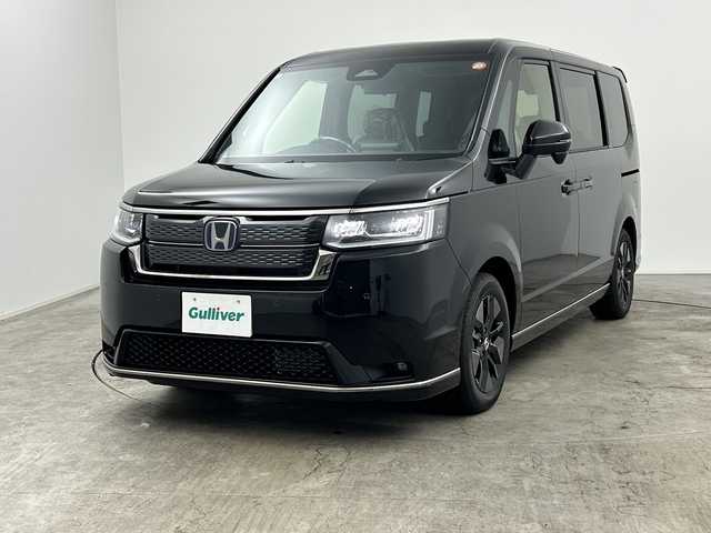 ホンダ ステップワゴン スパーダ eHEV 三重県 2025(令7)年 0.1千km クリスタルブラックパール 登録済未使用車/純正11.4インチナビ/バックカメラ/両側パワースライドドア/前席シートヒーター/パワーバックドア/ブラインドスポットモニター/パドルシフト/クリアランスソナー/LEDヘッドライト