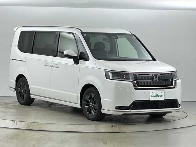 ホンダ ステップワゴン スパーダ eHEV 愛知県 2025(令7)年 0.1千km プラチナホワイトパール 11.4インチナビHonda CONNECTナビ /（LXM-247VFLi(317900円)）/フルセグTV/DVD再生/Bluetooth/MusicRack/バックカメラ/ホンダセンシング/・レーダークルーズコントロール/・衝突軽減ブレーキ/・オートハイビーム/・誤発進抑制/両側パワースライドドア/パワーバックドア/LEDヘッドライト/純正5本スポーク16インチアルミホイール/10.2インチデジタルグラフィックメーター/プラズマクラスター付トリプルゾーンオートエアコン/合皮/撥水ファブリックコンビシート/シートバックテーブル(前席)/スマートキーシステム/USBタイプCチャージャー(1～３列目)