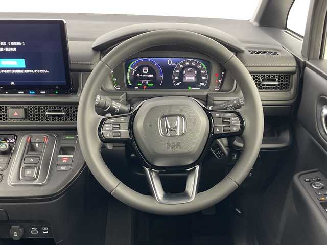 ホンダ ステップワゴン スパーダ eHEV 愛知県 2025(令7)年 0.1千km プラチナホワイトパール 11.4インチナビHonda CONNECTナビ /（LXM-247VFLi(317900円)）/フルセグTV/DVD再生/Bluetooth/MusicRack/バックカメラ/ホンダセンシング/・レーダークルーズコントロール/・衝突軽減ブレーキ/・オートハイビーム/・誤発進抑制/両側パワースライドドア/パワーバックドア/LEDヘッドライト/純正5本スポーク16インチアルミホイール/10.2インチデジタルグラフィックメーター/プラズマクラスター付トリプルゾーンオートエアコン/合皮/撥水ファブリックコンビシート/シートバックテーブル(前席)/スマートキーシステム/USBタイプCチャージャー(1～３列目)