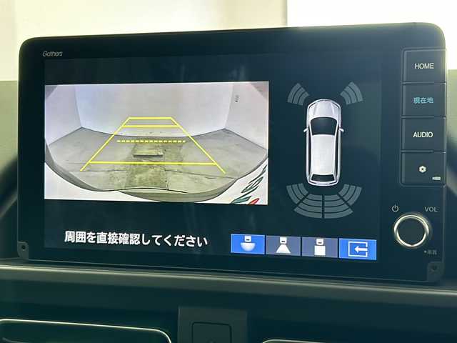 ホンダ フリード ハイブリット e:HEV クロスター 宮城県 2025(令7)年 0.1千km ベージュ 登録済未使用車　/純正９型ナビ　/アダプティブクルーズコントロール　/ＢＳＭ　/衝突軽減ブレーキ　/レーンキープアシスト　/オートハイビーム　/シートヒーター　/パーキングセンサー　/フロントウィンドウ熱線/バックモニター/Bluetoothオーディオ/フルセグTV/スマートフォン連携