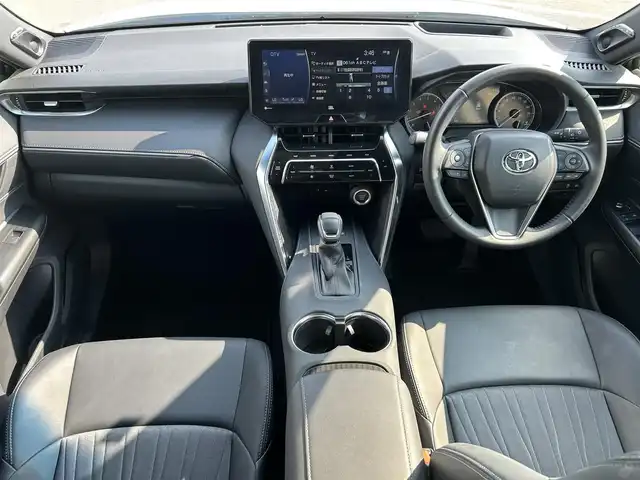 トヨタ ハリアー Z 和歌山県 2021(令3)年 1.5万km ホワイトパールクリスタルシャイン 純正１２．３インチナビ/JBLプレミアムサウンド/フルセグTV/バックカメラ/デジタルインナーミラー/（Bluetooth/USB/AUX)/プリクラッシュセーフティー/ブラインドスポットモニター/ヘッドアップディスプレイ/レーダークルーズコントロール/レーンキープアシスト/クリアランスソナー/パーキングサポートブレーキ/ロードサインアシスト/リヤトラフィックアラート/電子パーキング/オートホールド/MTモード付AT/純正ドライブレコーダー/純正ビルトインETC２．０/ハーフレザーシート/パワーシート/パワーバックドア/ISOFIX/LEDヘッドライト/LEDフォグランプ/オートライト/オートハイビーム