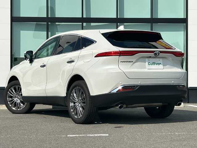 トヨタ ハリアー Z 和歌山県 2021(令3)年 1.5万km ホワイトパールクリスタルシャイン 純正１２．３インチナビ/JBLプレミアムサウンド/フルセグTV/バックカメラ/デジタルインナーミラー/（Bluetooth/USB/AUX)/プリクラッシュセーフティー/ブラインドスポットモニター/ヘッドアップディスプレイ/レーダークルーズコントロール/レーンキープアシスト/クリアランスソナー/パーキングサポートブレーキ/ロードサインアシスト/リヤトラフィックアラート/電子パーキング/オートホールド/MTモード付AT/純正ドライブレコーダー/純正ビルトインETC２．０/ハーフレザーシート/パワーシート/パワーバックドア/ISOFIX/LEDヘッドライト/LEDフォグランプ/オートライト/オートハイビーム