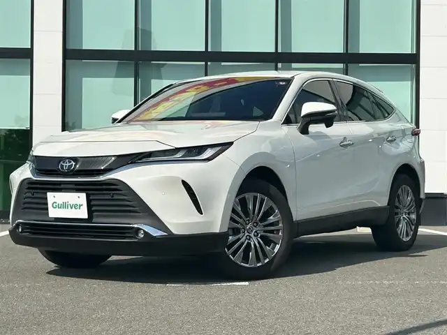 トヨタ ハリアー Z 和歌山県 2021(令3)年 1.5万km ホワイトパールクリスタルシャイン 純正１２．３インチナビ/JBLプレミアムサウンド/フルセグTV/バックカメラ/デジタルインナーミラー/（Bluetooth/USB/AUX)/プリクラッシュセーフティー/ブラインドスポットモニター/ヘッドアップディスプレイ/レーダークルーズコントロール/レーンキープアシスト/クリアランスソナー/パーキングサポートブレーキ/ロードサインアシスト/リヤトラフィックアラート/電子パーキング/オートホールド/MTモード付AT/純正ドライブレコーダー/純正ビルトインETC２．０/ハーフレザーシート/パワーシート/パワーバックドア/ISOFIX/LEDヘッドライト/LEDフォグランプ/オートライト/オートハイビーム