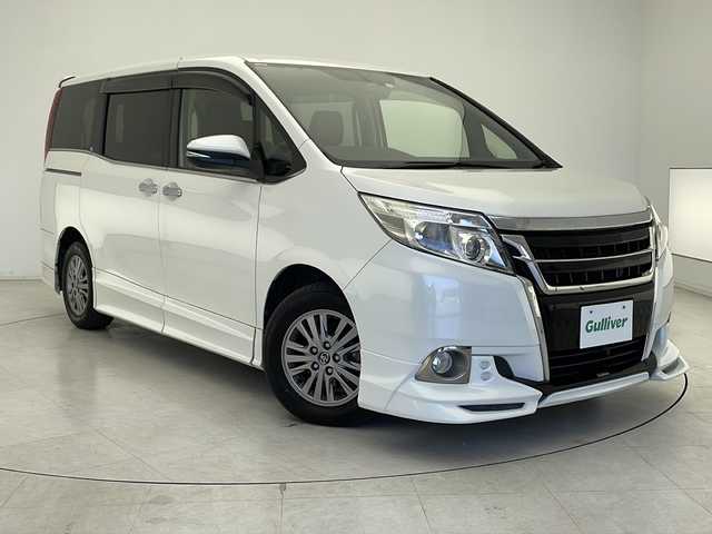 トヨタ エスクァイア Gi 千葉県 2015(平27)年 6万km ホワイトパールクリスタルシャイン 純正9インチメモリナビ /CD/DVD/BT/フルセグTV/バックカメラ/両側パワースライドドア/クルーズコントロール/TRD製エアロ/レザーシート/シートヒーター/スマートキー/プッシュスタート/ETC/電動格納ミラー/オートライト/フォグランプ/LEDヘッドライト/純正15インチアルミホイール
