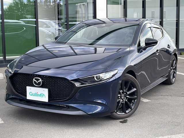 マツダ マツダ３ファストバック 15S ブラックトーンED 長野県 2022(令4)年 1.3万km ディープクリスタルブルーマイカ 4WD/純正SDナビ&フルセグTV&CD&DVD&USB&BT/アダプティブクルーズコントロール/レーンキープアシスト/衝突軽減ブレーキ/コーナーセンサー/ブラインドスポットモニター/ヘッドアップディスプレイ/アイドリングストップ/オートマチックハイビーム/純正前後ドライブレコーダー/ステアリングスイッチ/パドルシフト/MTモード付AT/全方位カメラ/ビルトインETC/LEDヘッドライト/オートライト/リアフォグランプ/電動格納ミラー/ウィンカーミラー/電動ホールド/オートホールド/純正18インチAW付サマータイヤ装着/社外16インチAW付スタッドレスタイヤ積込/純正フロアマット/純正ドアバイザー/プッシュスタート/スマートキー/スペアキー1本/純正エンジンスターター