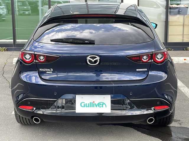 マツダ マツダ３ファストバック 15S ブラックトーンED 長野県 2022(令4)年 1.3万km ディープクリスタルブルーマイカ 4WD/純正SDナビ&フルセグTV&CD&DVD&USB&BT/アダプティブクルーズコントロール/レーンキープアシスト/衝突軽減ブレーキ/コーナーセンサー/ブラインドスポットモニター/ヘッドアップディスプレイ/アイドリングストップ/オートマチックハイビーム/純正前後ドライブレコーダー/ステアリングスイッチ/パドルシフト/MTモード付AT/全方位カメラ/ビルトインETC/LEDヘッドライト/オートライト/リアフォグランプ/電動格納ミラー/ウィンカーミラー/電動ホールド/オートホールド/純正18インチAW付サマータイヤ装着/社外16インチAW付スタッドレスタイヤ積込/純正フロアマット/純正ドアバイザー/プッシュスタート/スマートキー/スペアキー1本/純正エンジンスターター