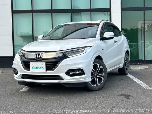 ホンダ ヴェゼル ハイブリッド Z ホンダセンシング 和歌山県 2019(令1)年 9.2万km プラチナホワイトパール 純正ナビ/バックカメラ/(BT/CD/DVD)/衝突軽減ブレーキ/レーンキープ/横滑り防止装置/アイドリングストップ/純正フロアマット/純正アルミホイール/LEDヘッドライト/オートライト/フォグランプ