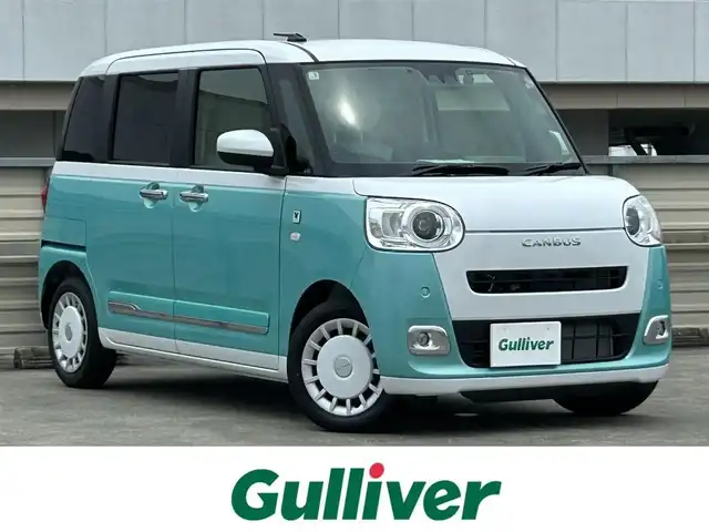 ダイハツ ムーヴ キャンバス ストライプス G ターボ 静岡県 2025(令7)年 0.2万km シャイニングホワイトパール/ファインミントメタリック ターボ車/スマートアシスト/純正９型ディスプレイ/フルセグＴＶ/HDMI/BTオーディオ/ＥＴＣ/バックカメラ/ＡＰＰＬＥＣＡＲＰＬＡＹ/両側電動スライドドア/ＬＥＤヘッドランプ/フォグライト/追従クルーズコントロール/ディズニー仕様シートカバー/ホットカップホルダー/純正フロアマット/スマートキー2本