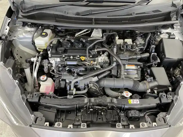 トヨタ ヤリス ハイブリッド G 千葉県 2021(令3)年 2万km アバンギャルドブロンズメタリック セーフティセンス（衝突回避支援パッケージ）/・プリクラッシュセーフティ/・レーントレーシングアシスト/・レーダークルーズコントロール/・オートマチックハイビーム/・ロードサインアシスト/・セカンダリーコリジョンブレーキ/・先行車発進告知機能/純正8インチディスプレイオーディオ/・コネクティッドナビ/・Bluetooth接続/・パノラミックビューモニター(全方位カメラ)/コーナーセンサー/スマートキー/LEDヘッドライト/ETC2.0