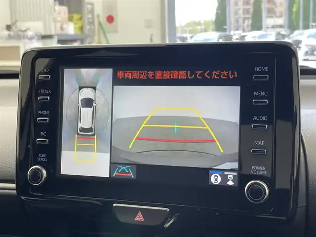 トヨタ ヤリス ハイブリッド G 千葉県 2021(令3)年 2万km アバンギャルドブロンズメタリック セーフティセンス（衝突回避支援パッケージ）/・プリクラッシュセーフティ/・レーントレーシングアシスト/・レーダークルーズコントロール/・オートマチックハイビーム/・ロードサインアシスト/・セカンダリーコリジョンブレーキ/・先行車発進告知機能/純正8インチディスプレイオーディオ/・コネクティッドナビ/・Bluetooth接続/・パノラミックビューモニター(全方位カメラ)/コーナーセンサー/スマートキー/LEDヘッドライト/ETC2.0