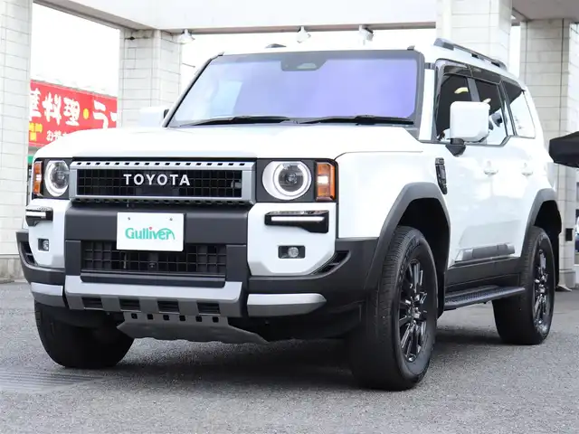トヨタ ランドクルーザー ２５０ VX 神奈川県 2024(令6)年 0.9万km プラチナホワイトパールマイカ ワンオーナー/デジタルインナーミラー/トヨタチームメイト/：アドバンストドライブ/：緊急時操舵支援/：フロントクロストラフィックアラート/：レーンチェンジアシスト/丸目一眼LEDヘッドランプ/：角目一眼LEDヘッドランプ有り/ブラインドスポットモニター/モデリスタエアロ/シートヒーター/エアーシート/サンルーフ/ETC2.0/スペアタイヤ/スペアキー/トヨタ純正メモリナビ/フルセグテレビ/全周囲カメラ/ウィンカーミラー/クルーズコントロール(追従機能付)/ドアバイザー/プッシュスタート/保証書/取説/記録簿(R7)