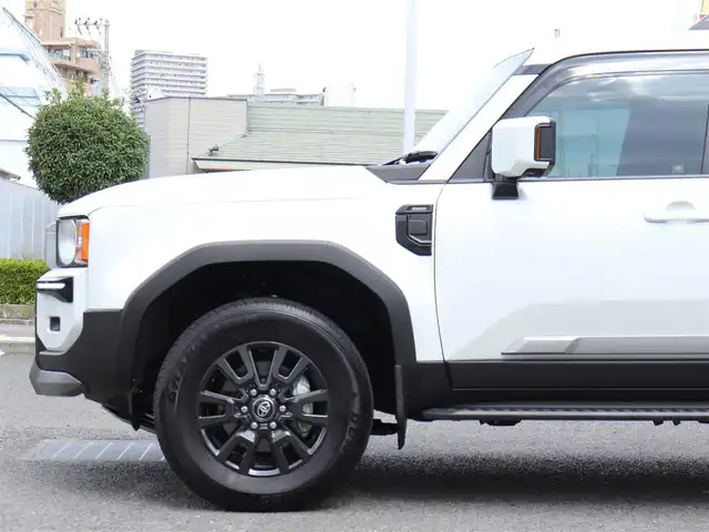 トヨタ ランドクルーザー ２５０ VX 神奈川県 2024(令6)年 0.9万km プラチナホワイトパールマイカ ワンオーナー/デジタルインナーミラー/トヨタチームメイト/：アドバンストドライブ/：緊急時操舵支援/：フロントクロストラフィックアラート/：レーンチェンジアシスト/丸目一眼LEDヘッドランプ/：角目一眼LEDヘッドランプ有り/ブラインドスポットモニター/モデリスタエアロ/シートヒーター/エアーシート/サンルーフ/ETC2.0/スペアタイヤ/スペアキー/トヨタ純正メモリナビ/フルセグテレビ/全周囲カメラ/ウィンカーミラー/クルーズコントロール(追従機能付)/ドアバイザー/プッシュスタート/保証書/取説/記録簿(R7)