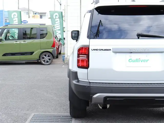 トヨタ ランドクルーザー ２５０ VX 神奈川県 2024(令6)年 0.9万km プラチナホワイトパールマイカ ワンオーナー/デジタルインナーミラー/トヨタチームメイト/：アドバンストドライブ/：緊急時操舵支援/：フロントクロストラフィックアラート/：レーンチェンジアシスト/丸目一眼LEDヘッドランプ/：角目一眼LEDヘッドランプ有り/ブラインドスポットモニター/モデリスタエアロ/シートヒーター/エアーシート/サンルーフ/ETC2.0/スペアタイヤ/スペアキー/トヨタ純正メモリナビ/フルセグテレビ/全周囲カメラ/ウィンカーミラー/クルーズコントロール(追従機能付)/ドアバイザー/プッシュスタート/保証書/取説/記録簿(R7)