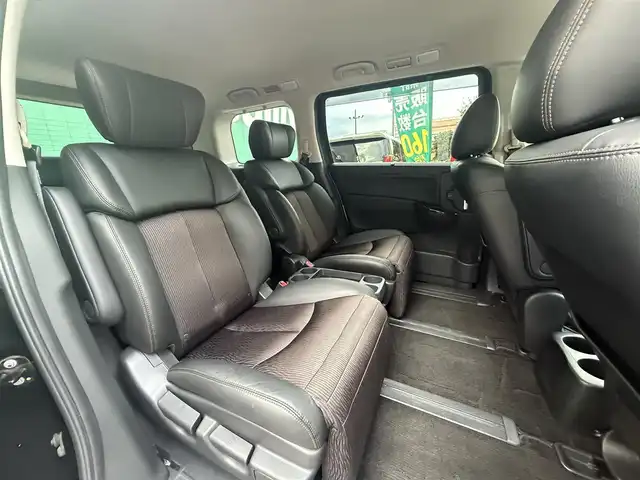 日産 エルグランド 250ハイウェイスターS 千葉県 2018(平30)年 3.6万km ファントムブラック 純正ナビ/(Bluetooth/フルセグTV/CD/DVD/FM)/バックカメラ/フリップダウンモニター/ドライブレコーダー/クルーズコントロール/両側パワースライドドア/オットマン(N席/2列目)/ロールサンシェード/ドアバイザー/純正18インチアルミホイール/純正フロアマット/サイド+カーテンエアバッグ/ETC/スマートキー