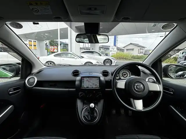 マツダ デミオ 13C 熊本県 2010(平22)年 3.1万km Ｌグリーン 社外ナビ（AVN119MM）/【ワンセグTV/CD/AM/FM】/オートライト/ドアバイザー/フロアマット/保証書/取扱説明書