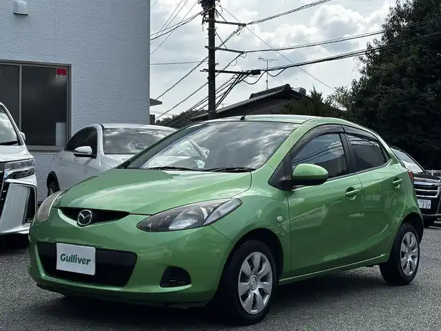 マツダ デミオ 13C 熊本県 2010(平22)年 3.1万km Ｌグリーン 社外ナビ（AVN119MM）/【ワンセグTV/CD/AM/FM】/オートライト/ドアバイザー/フロアマット/保証書/取扱説明書