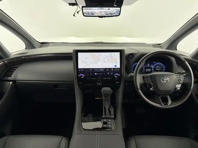 トヨタ アルファードハイブリット Z 愛知県 2024(令6)年 2.6万km プラチナホワイトパールマイカ セーフティセンス/・プリクラッシュセーフティ/・レーントレーシングアシスト/・レーンディパーチャーアラート/・全車速追従機能付レーダークルーズコントロール/・アダクティブハイビームシステム/・ロードサインアシスト/・ドライバー異常時対応システム/・プロアクティブドライビングアシスト/・発進遅れ告知機能/BSM（ブラインドスポットモニター）/14インチディスプレイオーディオ/（ナビ／BT/USB/HDMI/フルセグTV）/ETC2.0/パノラミックビューモニター/デジタルインナーミラー/おくだけ充電/シートヒーター/シートベンチレーション/パワーシート（運転席メモリー機能付）前席／2列目/パワーサンシェード　2列目／3列目/パワーバックドア/プッシュスタート／スマートキー/純正フロアマット／ドアバイザー