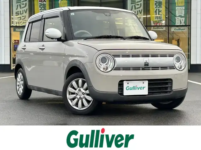 スズキ ラパン X 岡山県 2015(平27)年 8.2万km フォーンベージュメタリック/ホワイト2トーンルーフ 登録時走行距離81211km/純正ナビ/フルセグTV(AM/FM/CD/DVD/Bluetooth)/全方位カメラ/前後ドライブレコーダー/ビルトインETC/レーダーブレーキサポート/横滑り防止装置/アイドリングストップ/D席シートヒーター/USB入力端子/純正フロアマット/14インチ純正AW/電動格納ミラー/プッシュスタート/スマートキー×2