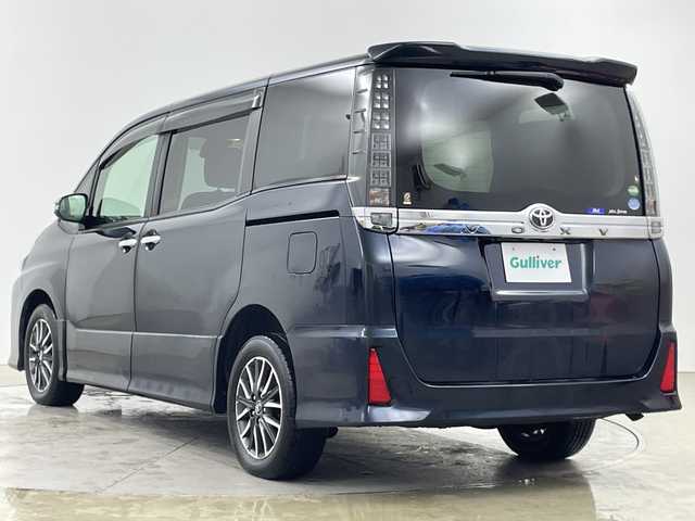 トヨタ ヴォクシー ZS 煌Ⅱ 道央・札幌 2016(平28)年 6.6万km ブラッキッシュアゲハガラスフレーク ・４ＷＤ/寒冷地仕様　/・トヨタセーフティーセンス　/・プリクラッシュセーフティ/・ＡＬＰＩＮＥ１１インチナビ/・DVD.CD.SD.BT.フルセグ　/・バックカメラ　/・フリップダウンモニター　/・LEDオートライト/オートハイビーム/・両側パワースライドドア　/・ビルトインＥＴＣ　/・スマートキー/プッシュスタート/・社外ＡＷ冬タイヤ積込