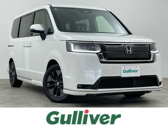 ホンダ ステップワゴン スパーダ eHEV 大分県 2025(令7)年 0.1万km未満 プラチナホワイトパール 純正11.4型ナビ/フルセグ/DVD/Bluetooth/バックカメラ/ホンダセンシング/レーダークルーズコントロール/減速セレクター/オートハイビーム/全列USBチャージャー/前席シートヒーター/パワーバックドア/両側パワースライドドア/オートLEDライト/パドルシフト/スマートキー