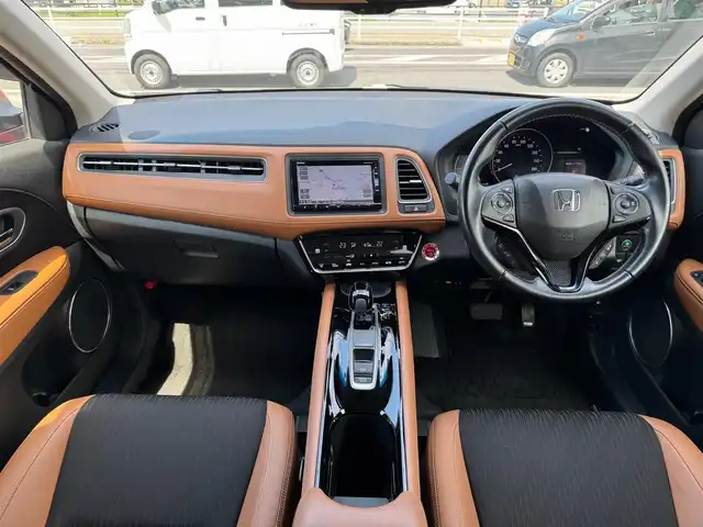 ホンダ ヴェゼル ハイブリッド Z ホンダセンシング 滋賀県 2018(平30)年 5.2万km プレミアムクリスタルレッドM ワンオーナー/純正フルセグナビ/　フルセグ Bluetooth CD DVD FM AM SD/バックカメラ/純正ドライブレコーダー/Honda SENSING/衝突軽減ブレーキ〈CMBS〉/誤発進抑制機能/歩行者事故低減ステアリング/路外逸脱抑制機能/ACC〈アダプティブ・クルーズ・コントロール〉/LKAS〈車線維持支援システム〉/先行車発進お知らせ機能/標識認識機能/コンフォートビューパッケージ/親水/ヒーテッドドアミラー/フロントドア撥水ガラス/熱線入りフロントウインドウ/純正LEDヘッドライト/純正LEDフォグランプ/純正17インチアルミ/運転席＆助手席シートヒーター/ルーフレール/コンビシート/スマートキー×2/プッシュスタート/