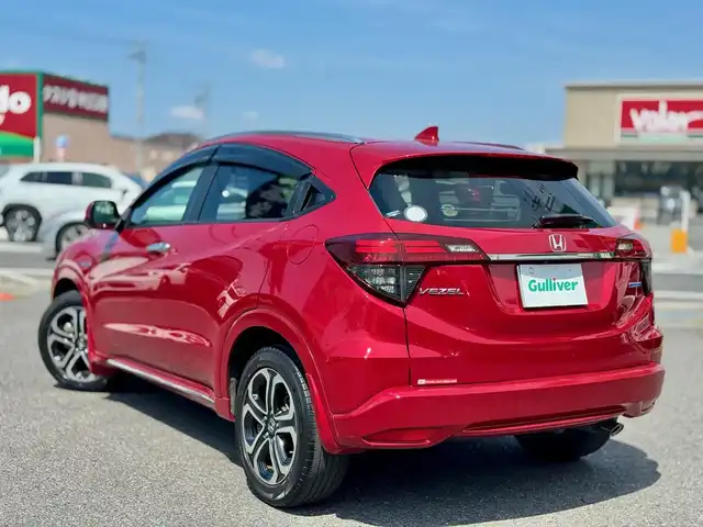 ホンダ ヴェゼル ハイブリッド Z ホンダセンシング 滋賀県 2018(平30)年 5.2万km プレミアムクリスタルレッドM ワンオーナー/純正フルセグナビ/　フルセグ Bluetooth CD DVD FM AM SD/バックカメラ/純正ドライブレコーダー/Honda SENSING/衝突軽減ブレーキ〈CMBS〉/誤発進抑制機能/歩行者事故低減ステアリング/路外逸脱抑制機能/ACC〈アダプティブ・クルーズ・コントロール〉/LKAS〈車線維持支援システム〉/先行車発進お知らせ機能/標識認識機能/コンフォートビューパッケージ/親水/ヒーテッドドアミラー/フロントドア撥水ガラス/熱線入りフロントウインドウ/純正LEDヘッドライト/純正LEDフォグランプ/純正17インチアルミ/運転席＆助手席シートヒーター/ルーフレール/コンビシート/スマートキー×2/プッシュスタート/